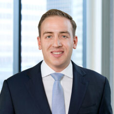 A professional headshot of Stephen Lapatin in front of windows.