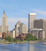 The Providence skyline with the Providence River in the foreground.