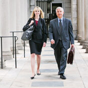 Two attorneys from Adler Pollock & Sheehan representing the State of Rhode Island in a pension case.